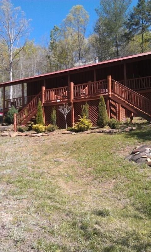 This is back of the Bunkhouse, and is where the hot tub and firepit are located.