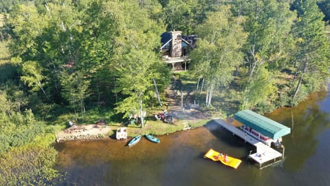 Gresham Retreat sits on a private peninsula with a waterfront gathering space