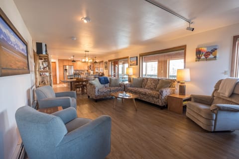 Mid-level living room with new laminate flooring.