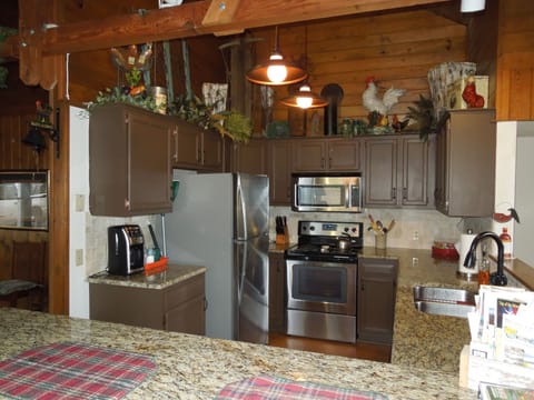 Updated kitchen, crock pot, coffeemaker, blender, pots/pans.  