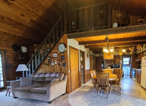 View of loft, dining and kitchen areas