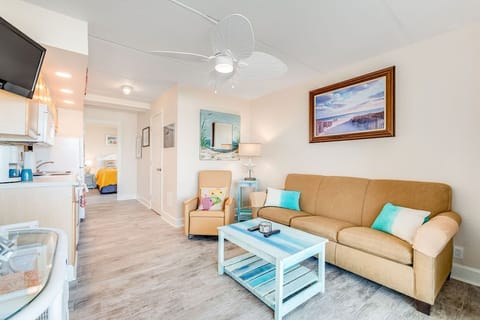 Living room with Queen sleeper sofa and flat screen TV