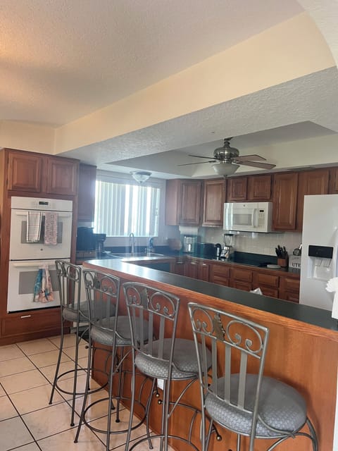 Kitchen view with 4 stools