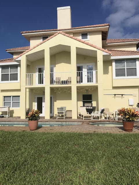 Back of home from pool
