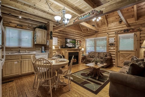 Cabin Rental in the Smokies - A Smoky Getaway - Dining area and living room