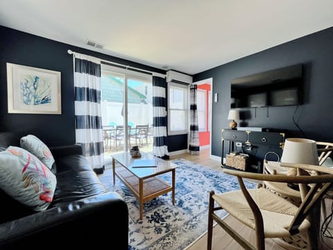 Family room with slider to outdoor patio