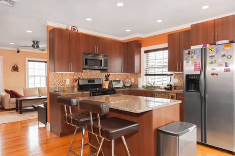 Kitchen with granite counter tops and stainless steel appliances