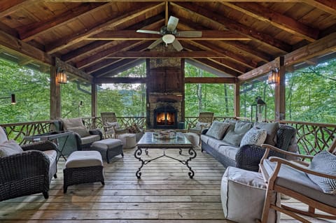 Back Screened Porch with Log Burning Fireplace and TV above Mantel