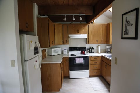 Kitchen includes all the basics. Skylight and dishwasher not pictured.