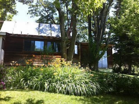 View of the south side of the house from the lower yard.