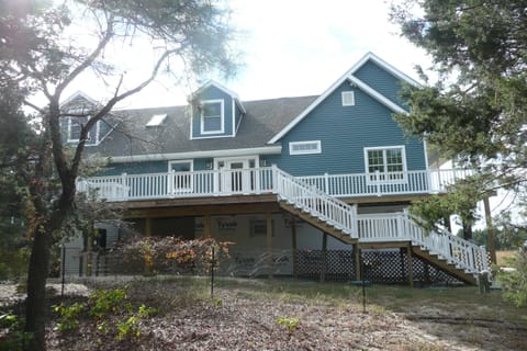 Decks surround three sides of home