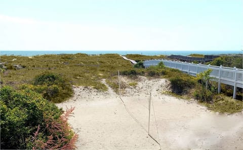 Our Private Walkway to the Beach (white) & our Badminton/Volleyball sand court