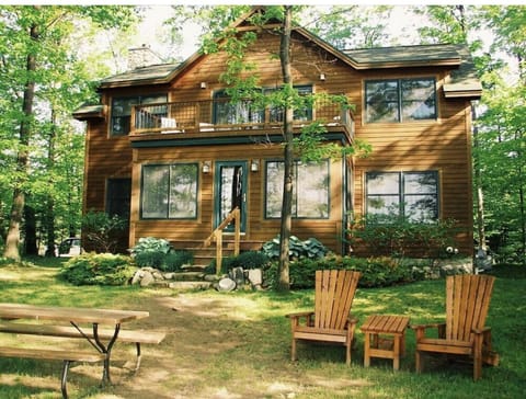 Lakeside view; upper porch provides tranquil space with bird's eye view of lake