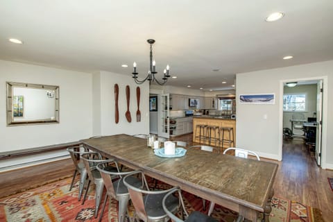 Large dining room, door to pantry and second refrigerator and powder room