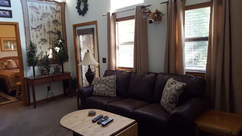 2nd floor family room with access to a deck