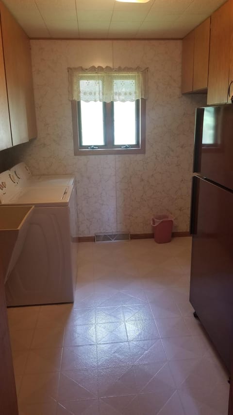 Laundry on first floor and an extra refrigerator for food and drink