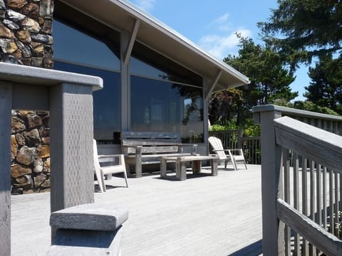 View of the house and deck from the private staircase to the beach.