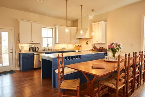 Custom made dining room table, made from cherry wood milled on the farm.