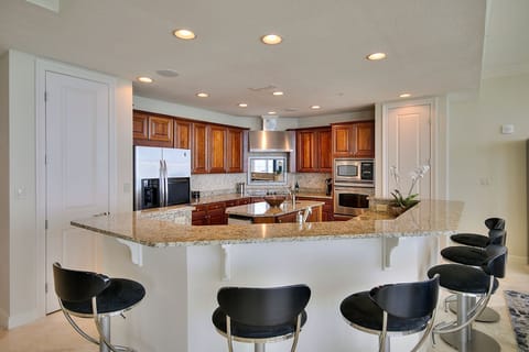 Breakfast bar seats 3 as there are no longer six barstools, only 3.