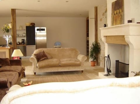 Reception Room is inviting at any time of day with its comfy sofas& fireplace