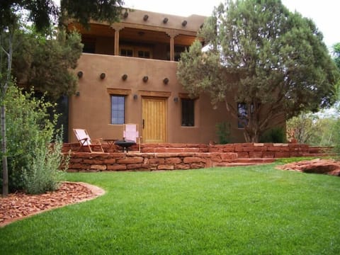 Property lawn and patio, available for guest use on request