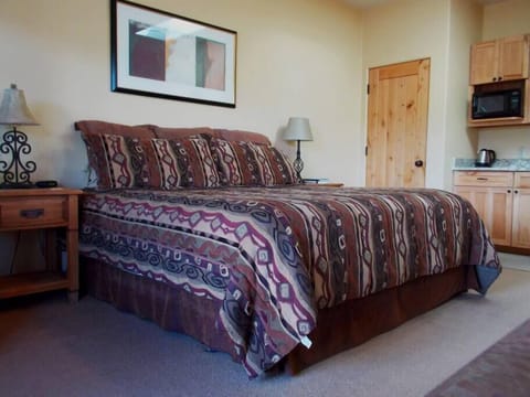 Top-of-the-line king-sized pillow-top bed, plus kitchenette