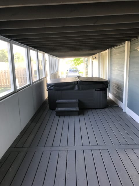 hot tub on screened porch