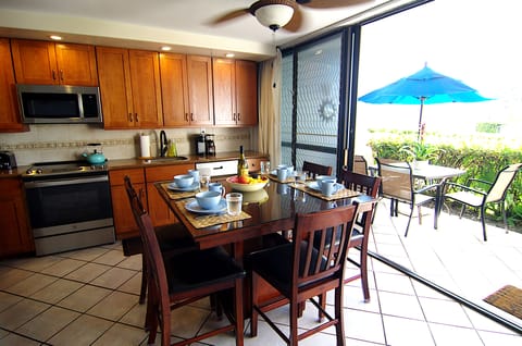 Kitchen opens up to the lanai.