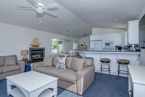 Two full sofas and fireplace