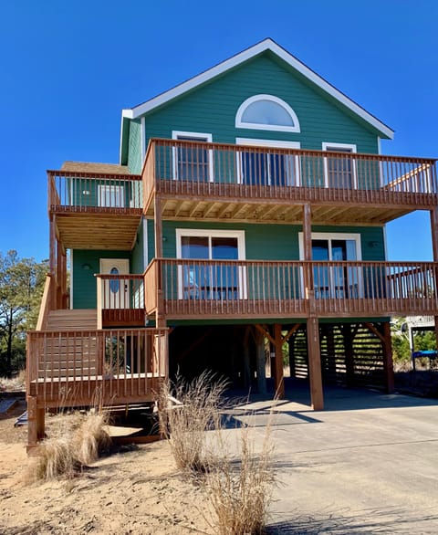 This charming property offers a reverse floor plan and deck access all rooms. 