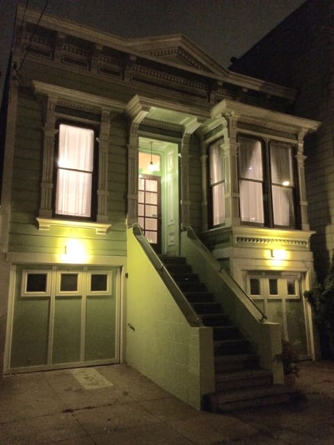 Front of house at night.
