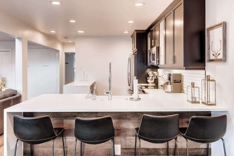 Bar seating at the kitchen counter