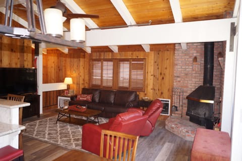 Upstairs  Great Room with wood burning fire place 
