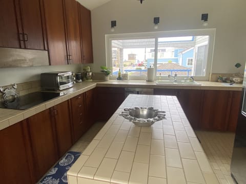 2nd floor kitchen with white water ocean views 