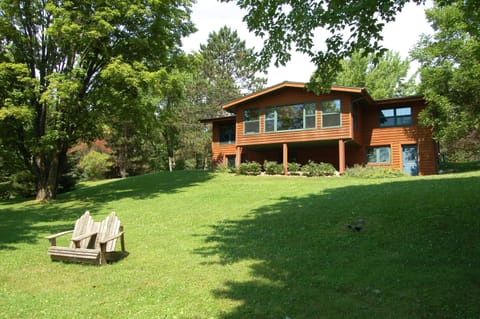 Back view of the lodge. All windows face lake.