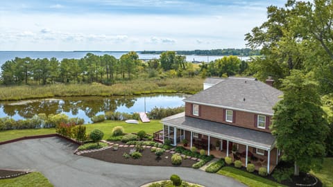 House, pond, property. Private beach and Chesapeake Bay is behind far tree line.