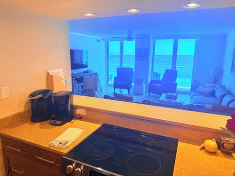 Cook dinner while your family watches tv all while watching the waves 🌊