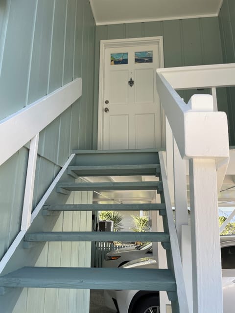 Covered entry from covered parking area