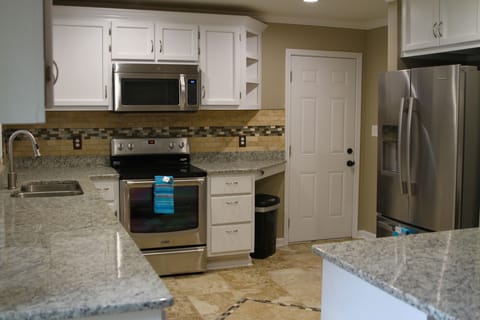 Brand new kitchen. Granite countertops. 