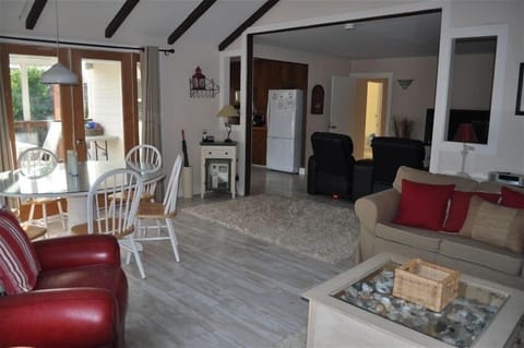 Living room, looking toward TV room and kitchen