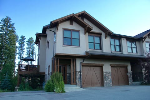 Exterior including 1 car garage and 2 parking spots