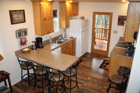 Kitchen with eating peninsula.