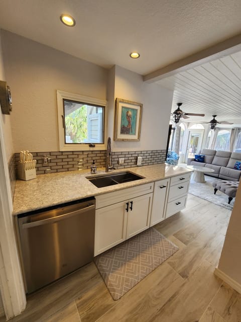 kitchen with glass tile backsplash