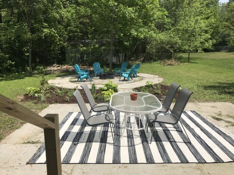 Large backyard with woods, w/ large gas grill, fire pit and outdoor shower 