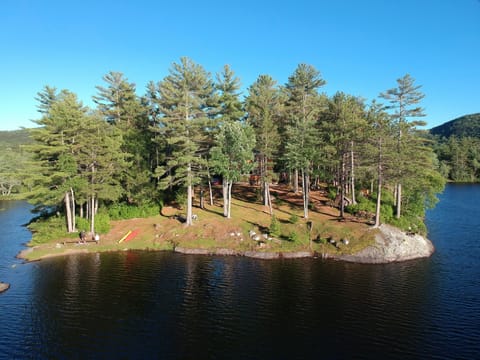 An aerial view of the peninsula showing the house right of center
