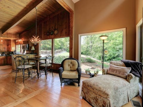 Siting area overlooking side yard, entrance and lake