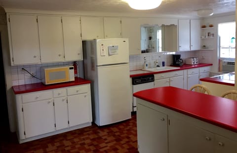 kitchen with bar to seat 3 + built in bench system seats 6 total; ;not shown