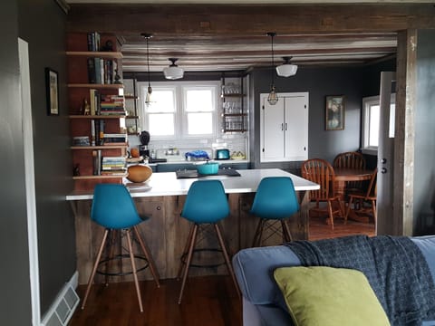 eat in kitchen with bar and gas stove