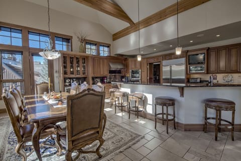 Dining Room with separate wet bar with wine refrigerator