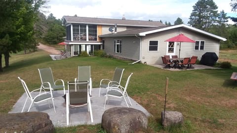 Front and  Side of House with Fire Pit
